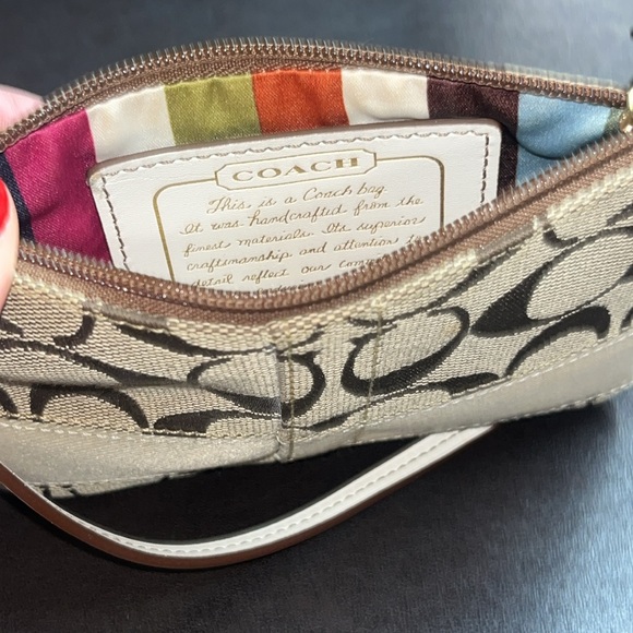 Coach Signature Brown & Beige Wristlet with Rainbow Stripe Interior - Picture 1 of 10
